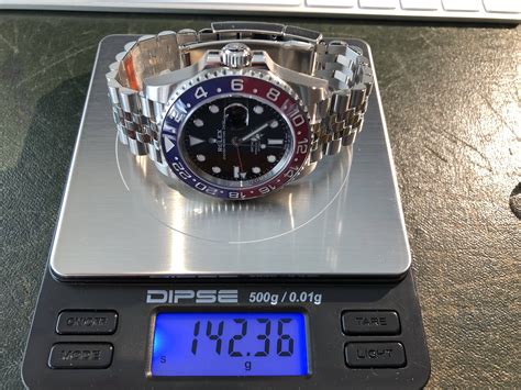 how many grams does a rolex submariner weigh|Rolex watch weight chart.